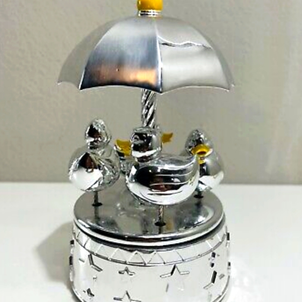 COPY - Reed and Barton silver rotating carousel. Something duckie nursery music…